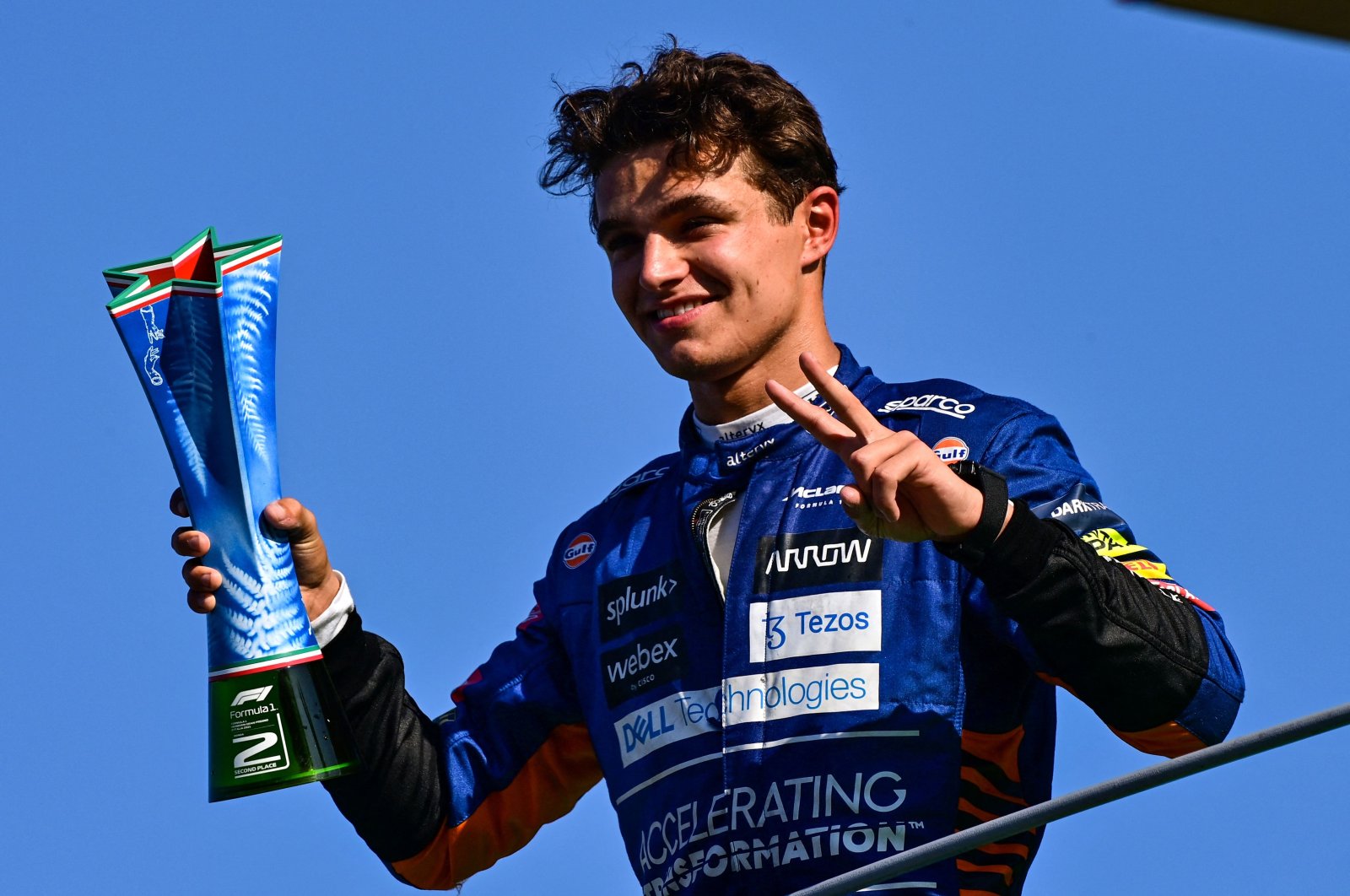 Second-placed McLaren's British driver Lando Norris celebrates on the podium after the Italian Formula One Grand Prix in Monza, Italy, Sept. 12, 2021. (AFP Photo)