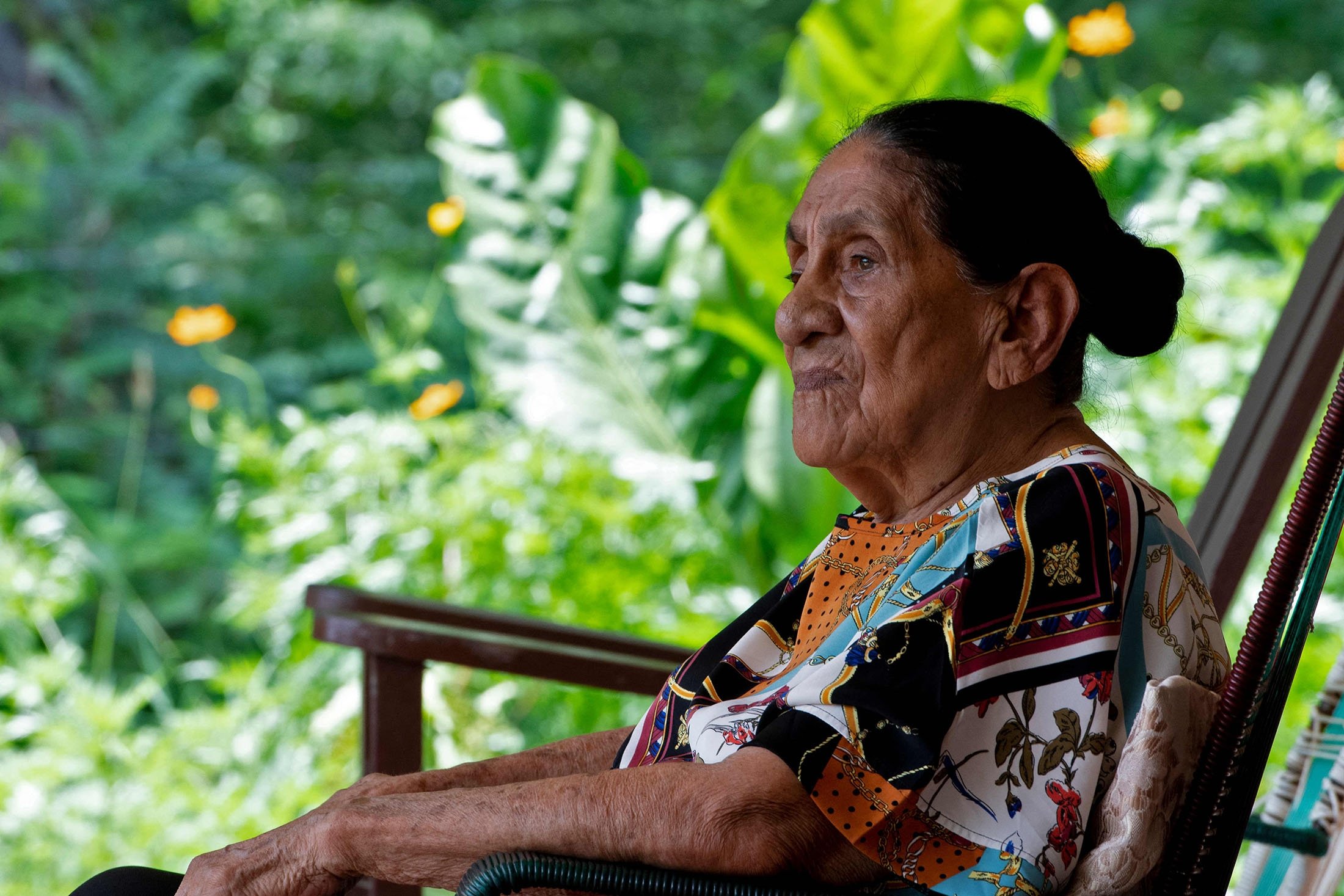 Natividad “Talia” Matarrita Fonseca, 93, sits at her home in Nicoya, Costa Rica, Aug. 28, 2021. (AFP Photo)