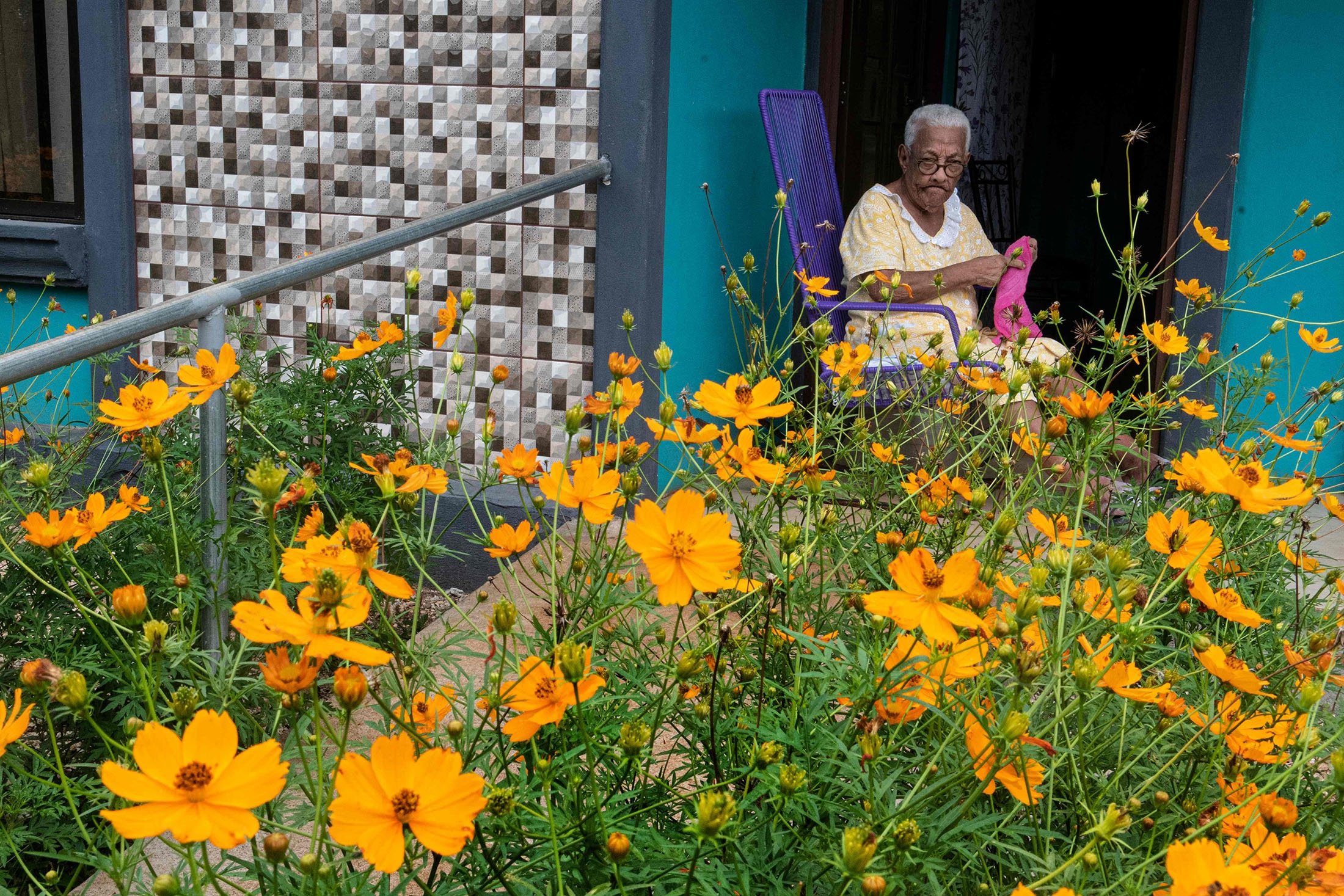 Felipa Enriquez, 99, sits outside her home in Nicoya, Costa Rica, Aug. 27, 2021. (AFP Photo)