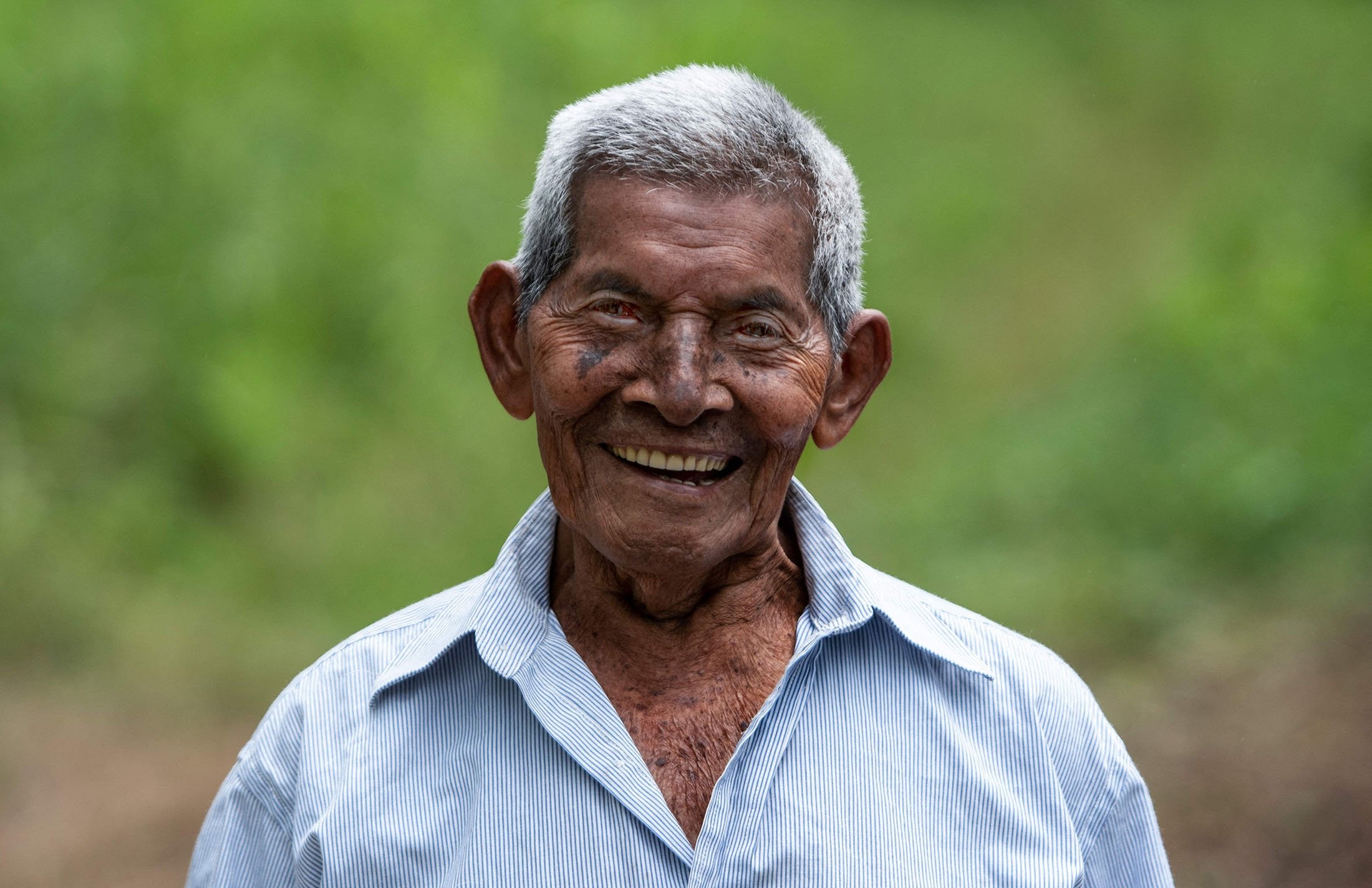 Saturnino Lopez Hernandez, 94, smiles at his home in Nicoya, Costa Rica, Aug. 27, 2021. (AFP Photo)