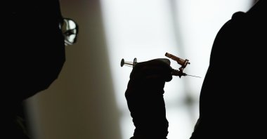 A nursing student administers the Moderna COVID-19 vaccine at a vaccination center at UNLV, in Las Vegas, U.S., April 26, 2021. (AP Photo)