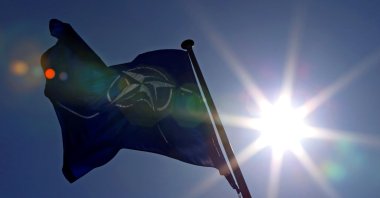 A NATO flag flies at the Alliance headquarters in Brussels during a NATO ambassadors meeting on the situation in Ukraine and the Crimea region, March 2, 2014. (Reuters Photo)