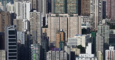 A general view of high-rise residential buildings and skyscrapers are seen in Hong Kong, Sept. 21, 2021. (AP Photo)