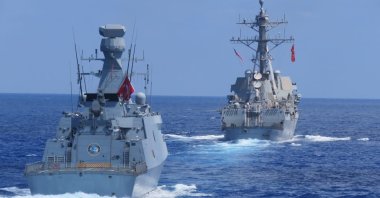 Turkish frigates TCG Barbaros and TCG Burgazada conducts maritime training with American destroyer USS Winston S. Churchill in the Eastern Mediterranean, Aug. 26, 2020. (DHA)