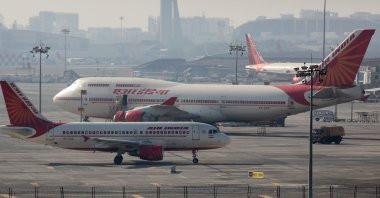 Air India passenger planes are seen at the Chhatrapati Shivaji International Airport in Mumbai, India, Dec. 17, 2015. (EPA Photo)