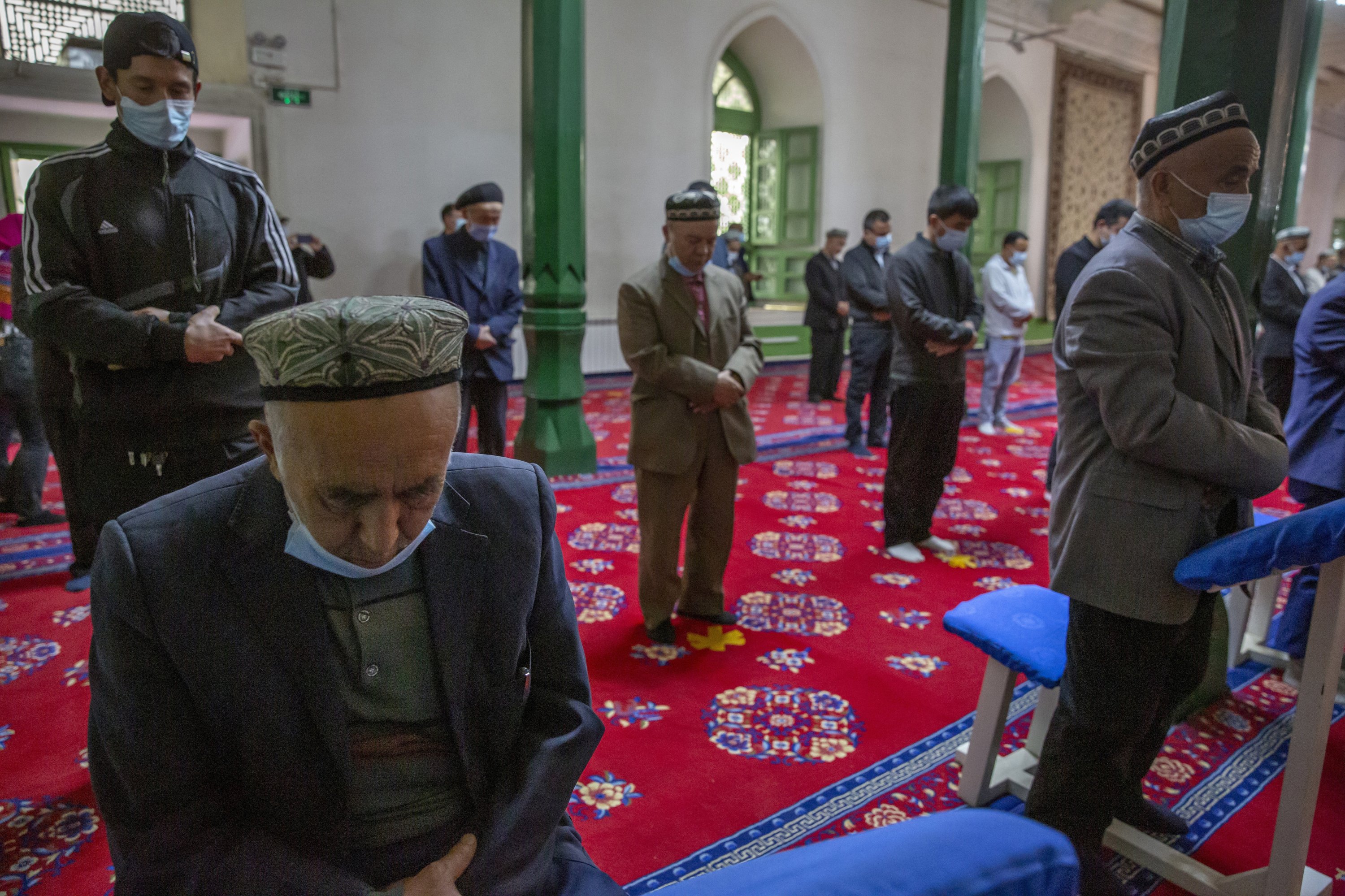 Uyghurs and other members of the faithful pray during services at the Id Kah Mosque in Kashgar, Xinjiang Uyghur Autonomous Region, China, April 19, 2021. (AP Photo)
