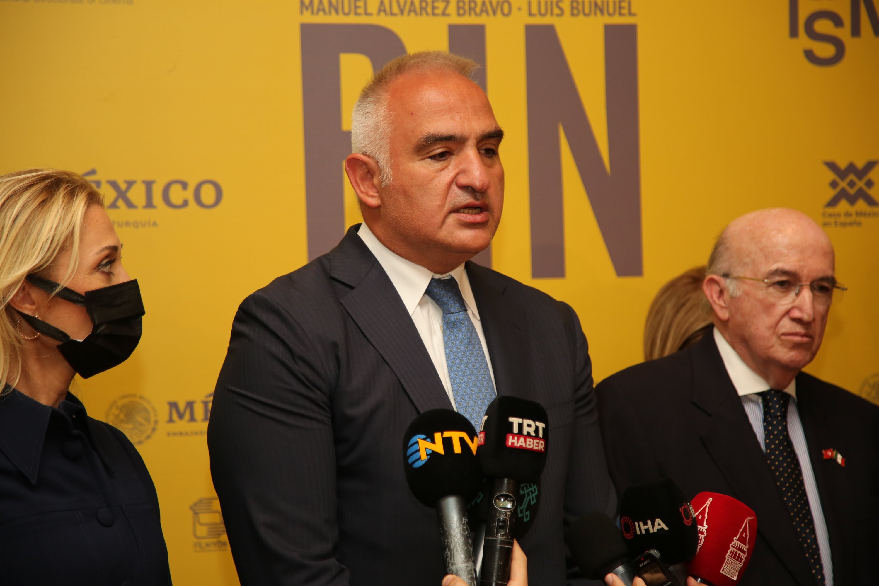 Minister of Culture and Tourism Mehmet Nuri Ersoy (C) speaks during the "Nazarin" exhibition at the Istanbul Cinema Museum, in Istanbul, Turkey, Oct. 8, 2021.