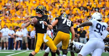 Iowa Hawkeyes quarterback Spencer Petras (7) throws a pass during the second quarter against the Penn State Nittany Lions at Kinnick Stadium, Iowa City, Iowa, Oct. 9, 2021. (Jeffrey Becker-USA TODAY Sports via Reuters)
