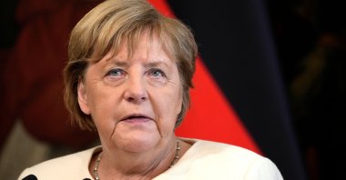 German Chancellor Angela Merkel talks during a joint news conference with Italian Prime Minister Mario Draghi (not pictured) in Rome, Italy, Oct. 7, 2021. (Reuters Photo)