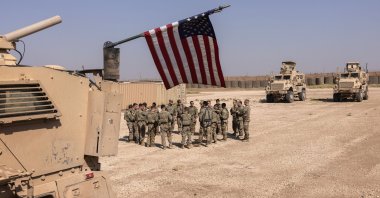 U.S. soldiers prepare to go out on patrol in coordination with YPG terrorists from a remote combat outpost in northeastern Syria, May 25, 2021. (Getty Images)