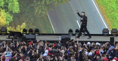 Elon Musk, Tesla CEO, arrives at an open house at the Tesla Gigafactory in Gruenheide, east of Berlin, Germany, Oct. 9, 2021. (dpa via AP)