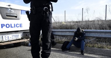 Greek police detain a migrant near the town of Orestiada, in the Evros region, at the Greek-Turkish border, March 3, 2020. (AP File Photo)