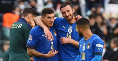 Italy's Giovanni Di Lorenzo (L), Bryan Cristante (C) and Lorenzo Insigne celebrate winning the UEFA Nations League third-place playoff against Belgium, Allianz Stadium, Turin, Italy, Oct. 10, 2021.