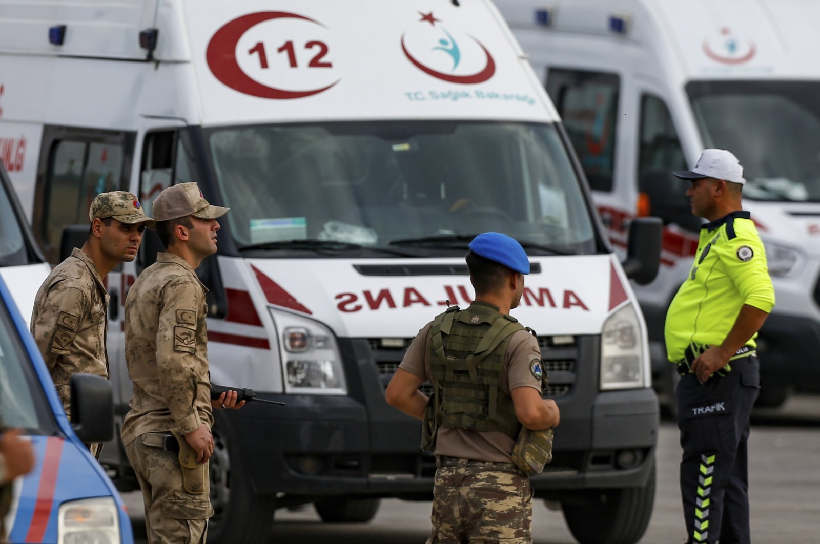 Turkish soldiers wait for an ambulance at the Karkamis border gate in Gaziantep province, southeastern Turkey, Oct. 16, 2019. (AP File Photo)