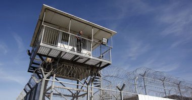 An Israeli prison guard keeps watch from a tower at Ayalon prison in Ramle near Tel Aviv, Israel, Feb. 13, 2013. (Reuters Photo)