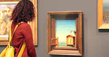 "Two Children Frightened by a Nightingale" (1924) by the artist Max Ernst is among the many works in the Met exhibition "Surrealism Beyond Borders" in New York City, U.S. (DPA PHOTO)