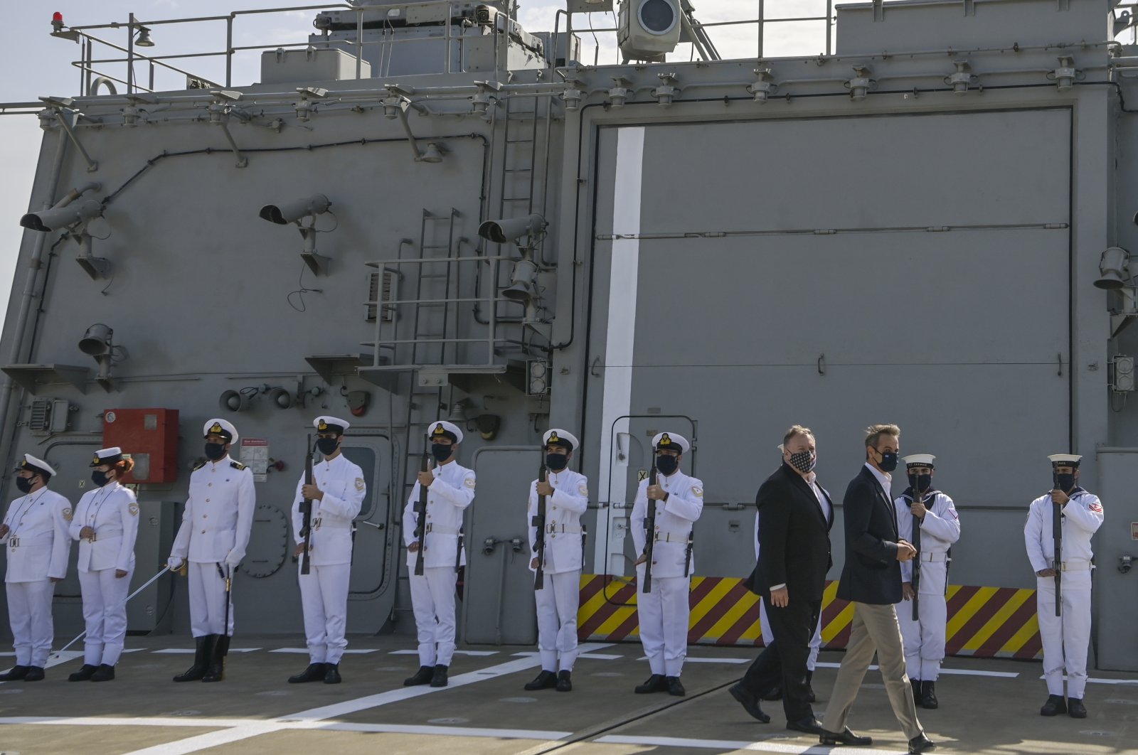 U.S. Secretary of State Mike Pompeo, (L), and Greek Prime Minister Kyriakos Mitsotakis visit the Greek frigate Salamis at the Naval Support Activity base at Souda, on the Greek island of Crete, Tuesday, Sept. 29, 2020. (AP File Photo)
