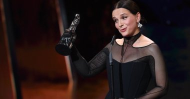 Oscar-winning French actress Juliette Binoche accepts the European Achievement in World Cinema award during the European Film Festival awards ceremony in Berlin, Germany, Dec. 7, 2019. (AFP Photo)