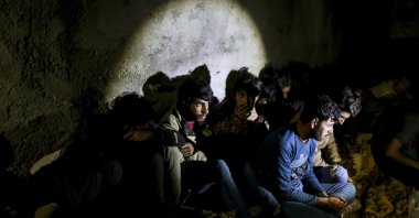 Turkish security forces apprehend a group of irregular migrants in an operation aimed at stemming the recent influx of migration, mainly coming from Afghanistan and stopping human trafficking operations in the area at the border province of Van, eastern Turkey, Aug. 21, 2021. (AP Photo)