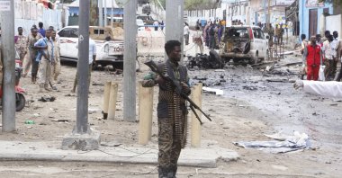 A Somali soldier secures the area after a car bomb attack at a Presidential Palace checkpoint in Mogadishu, Somalia, Sept. 25, 2021. (AP File Photo)