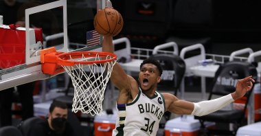 Milwaukee Bucks' Giannis Antetokounmpo dunks the ball during an NBA match against the Brooklyn Nets at the Fiserv Forum, in Milwaukee, U.S., June 13, 2021. (Getty Images)
