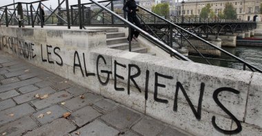 A slogan "We drown Algerians here" is painted on the wall of the Seine River banks near the Pont des Arts in Paris, France, Oct. 17, 2011. (Reuters Photo)