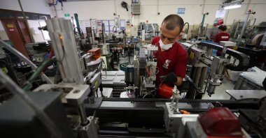 A worker is seen at a factory manufacturing auto parts in the northwestern province of Bursa, Turkey, Sept. 20, 2021. (AA Photo)