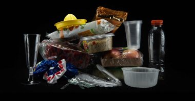Plastic containers, cutlery and plastic-wrapped food packaging in a studio in Paris, France, Aug. 12, 2018 (AFP File Photo)