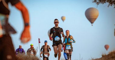Athletes compete in the Salomon Cappadocia Ultra-Trail held in Nevşehir, Turkey, Oct. 19, 2019. (IHA Photo)