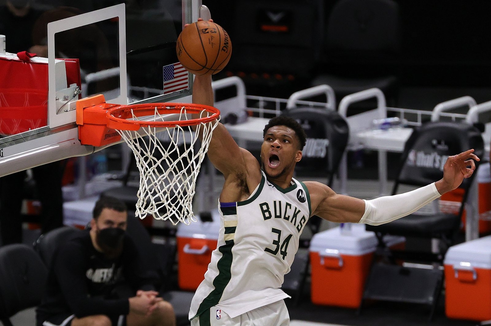Milwaukee Bucks' Giannis Antetokounmpo dunks the ball during an NBA match against the Brooklyn Nets at the Fiserv Forum, in Milwaukee, U.S., June 13, 2021. (Getty Images)
