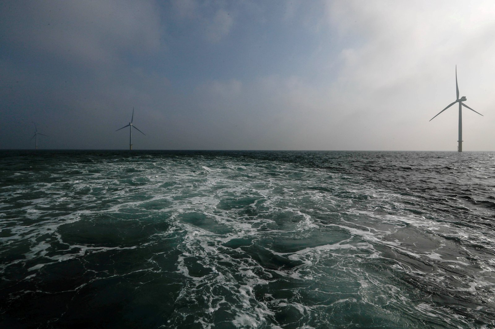 Power-generating windmill turbines are seen at the Eneco Luchterduinen offshore wind farm near Amsterdam, Netherlands, Sept. 26, 2017. (Reuters Photo)