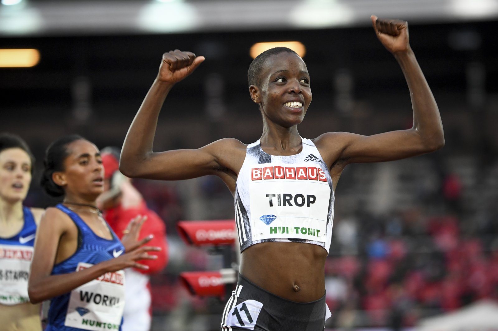 Kenya's Agnes Tirop smiles after winning the women's 1500-meter race at the IAAF Diamond League meeting at Stockholm Olympic Stadium in Stockholm, Sweden, May 30, 2019. (AP Photo)