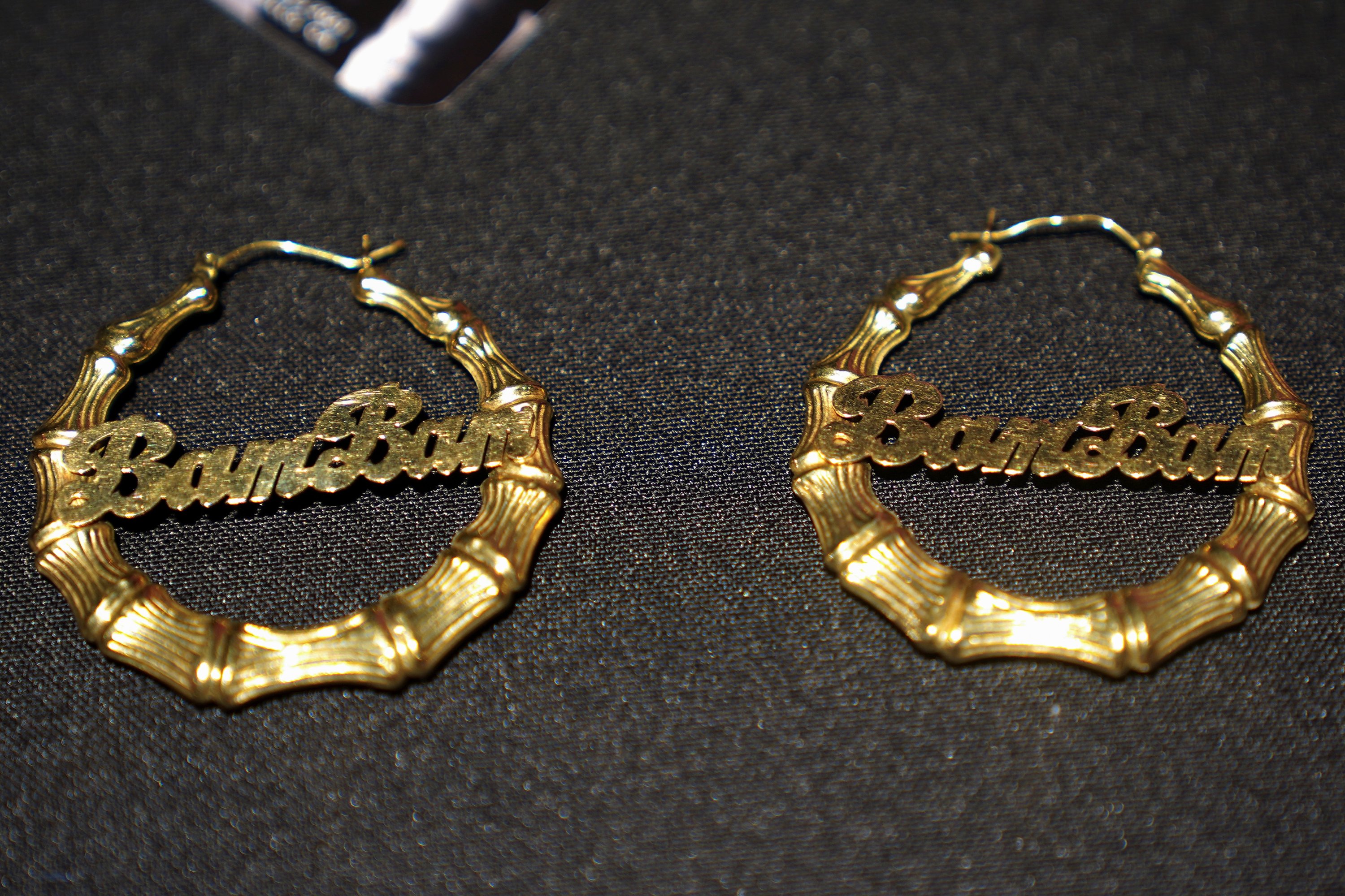 A pair of earrings worn by Amy Winehouse are pictured at a preview for an auction of her personal items on the 10th anniversary of her death in the Manhattan borough of New York City, New York, U.S., Oct. 11, 2021.  (REUTERS Photo)