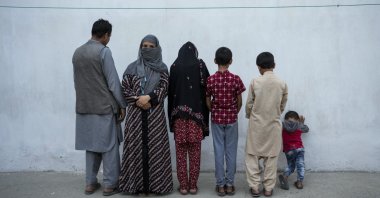 Najia (2nd L) poses with her family in Kabul, Afghanistan, Oct. 1, 2021. (AP Photo)