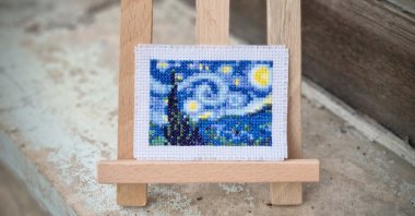 A recreation of "The Starry Night" from Elçin Özcan's mini-gallery comprising of cross-stitch versions of the world's most famous masterpieces. (DPA Photo)