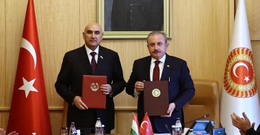 Parliament Speaker Mustafa Şentop (R), Tajik counterpart Mahmadtoir Zokirzoda pose after signing the interparliamentary cooperation protocol in Ankara, Turkey, Oct. 13, 2021. (AA Photo)