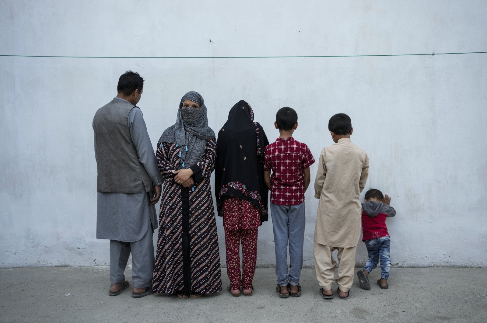 Najia (2nd L) poses with her family in Kabul, Afghanistan, Oct. 1, 2021. (AP Photo)