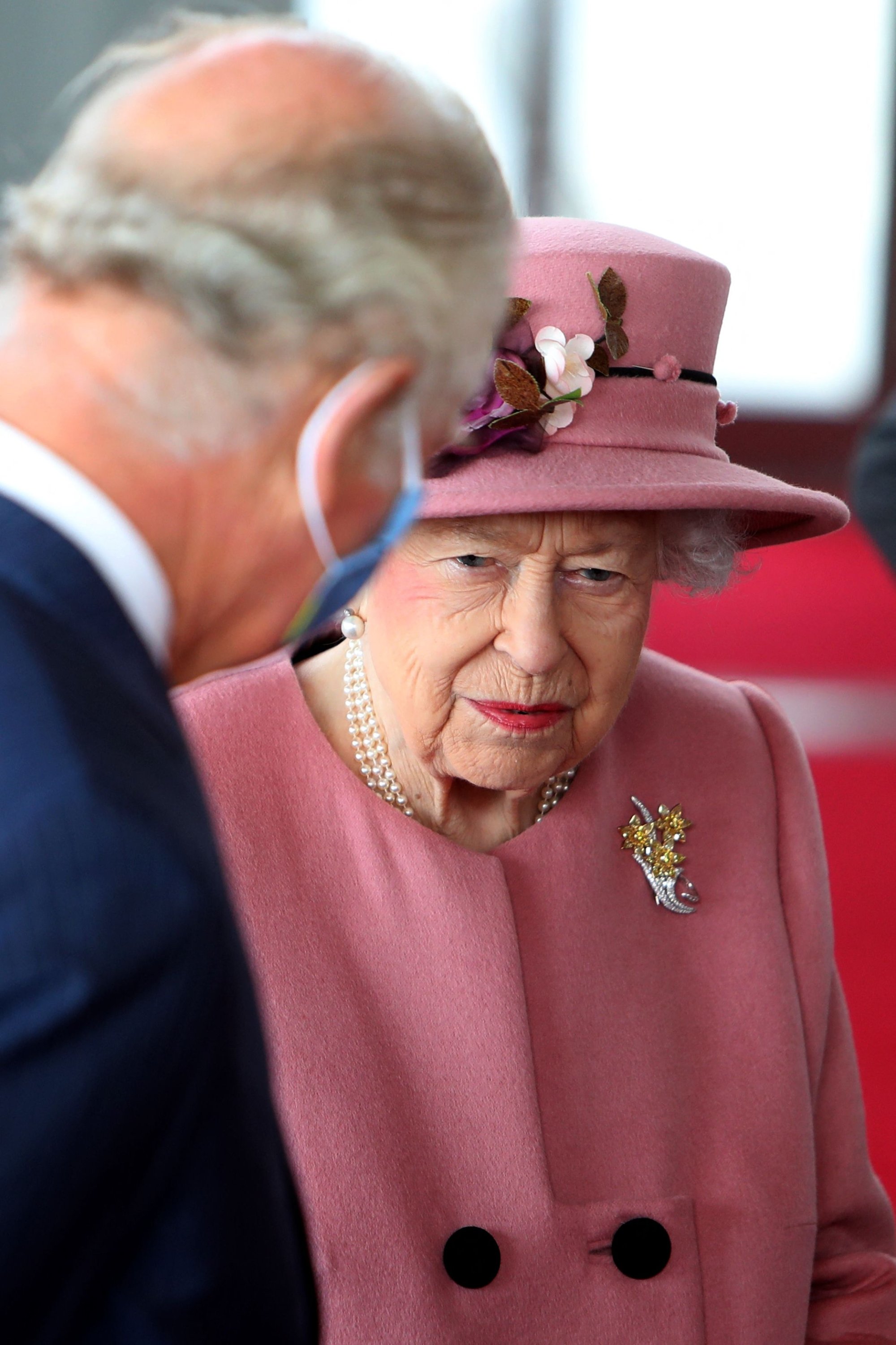 Britain's Queen Elizabeth II speaks with Britain's Prince Charles on her arrival to attend the ceremonial opening of the sixth Senedd, in Cardiff, Wales, Oct. 14, 2021. (AFP Photo)