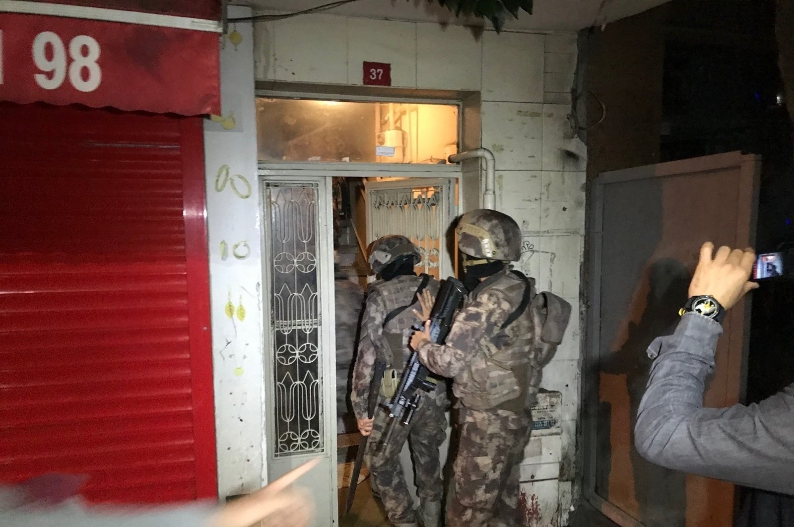 Police raid a house during an operation against DHKP-C in Istanbul, Turkey, Oct. 29, 2020. (IHA Photo)