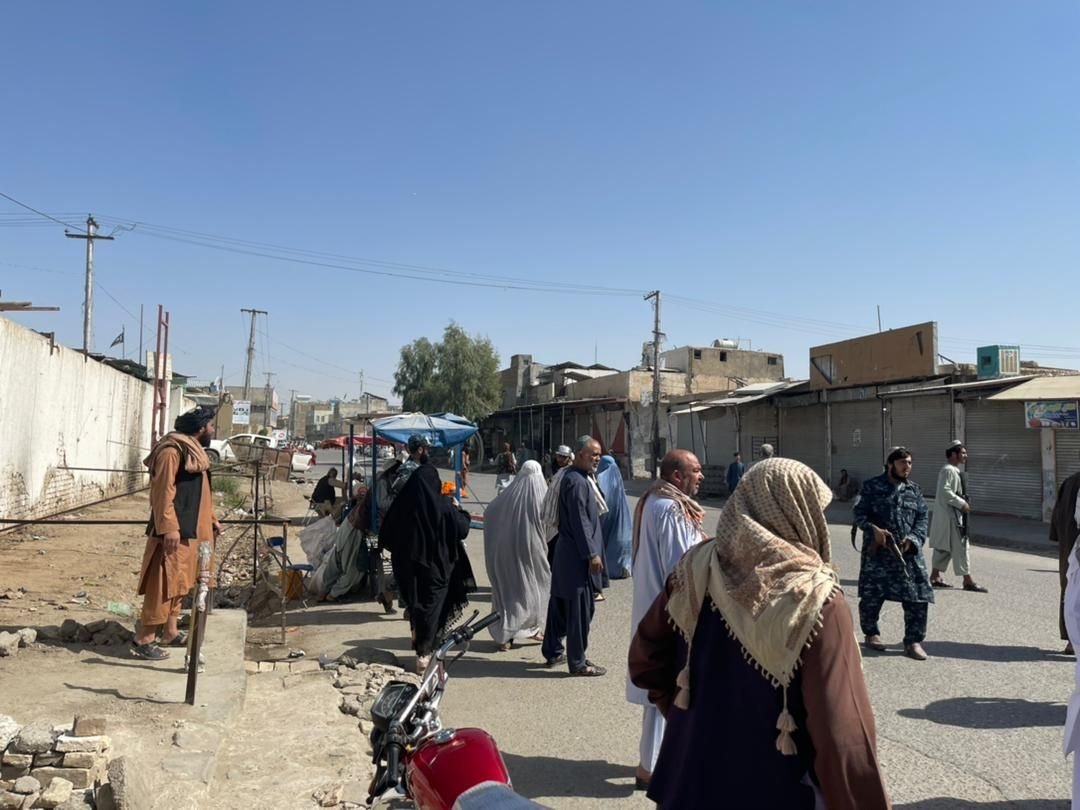 People gather after a bomb explosion hit a mosque for the Shiite community in Kandahar, Afghanistan, Oct. 15, 2021. (AA Photo)