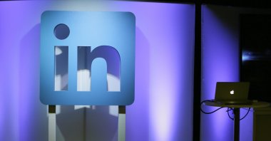 The LinkedIn logo is displayed during a product announcement in San Francisco, U.S., Sept. 22, 2016. (AP Photo)