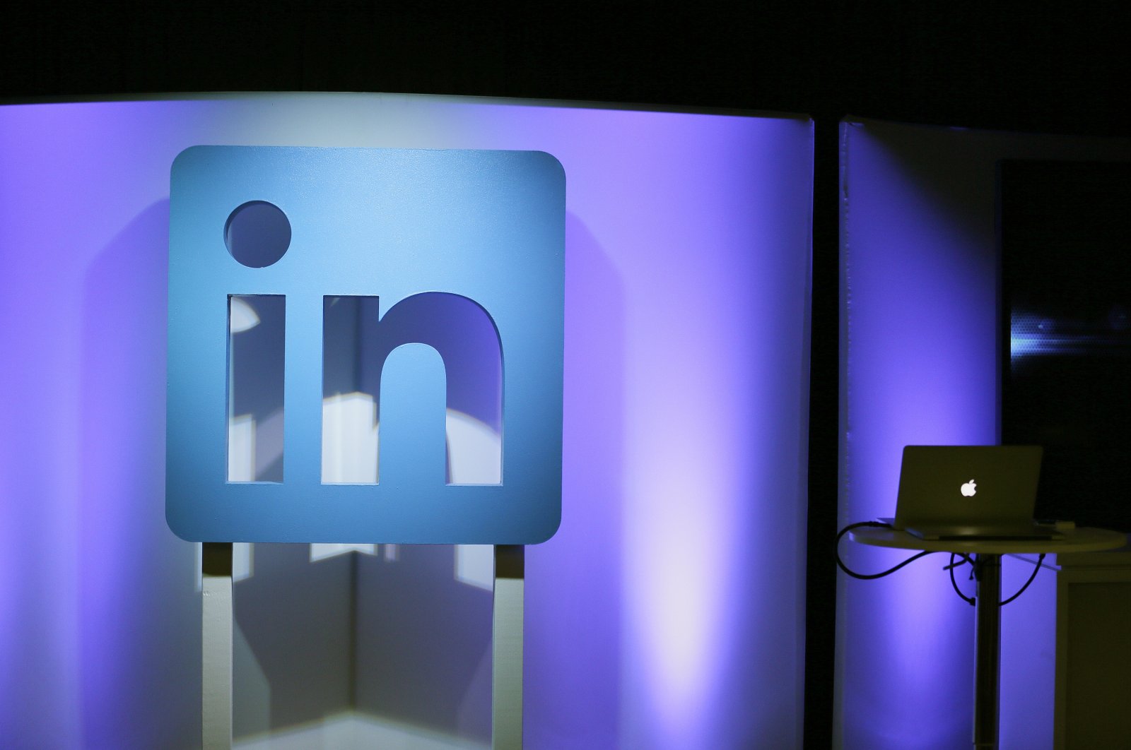 The LinkedIn logo is displayed during a product announcement in San Francisco, U.S., Sept. 22, 2016. (AP Photo)