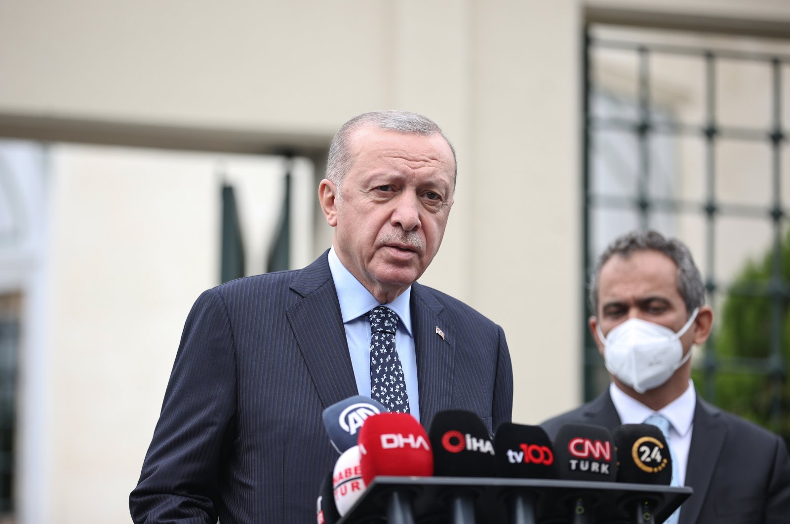 President Recep Tayyip Erdoğan speaking to reporters after Friday prayers in Istanbul, Turkey, Oct. 15, 2021. (AA Photo)