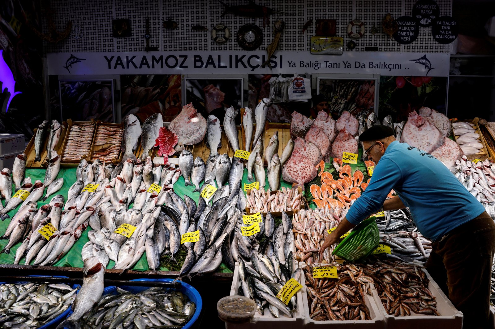 People shop at a fish market in the Karaköy district of Istanbul, Turkey, Jan. 8, 2021. (Reuters Photo)