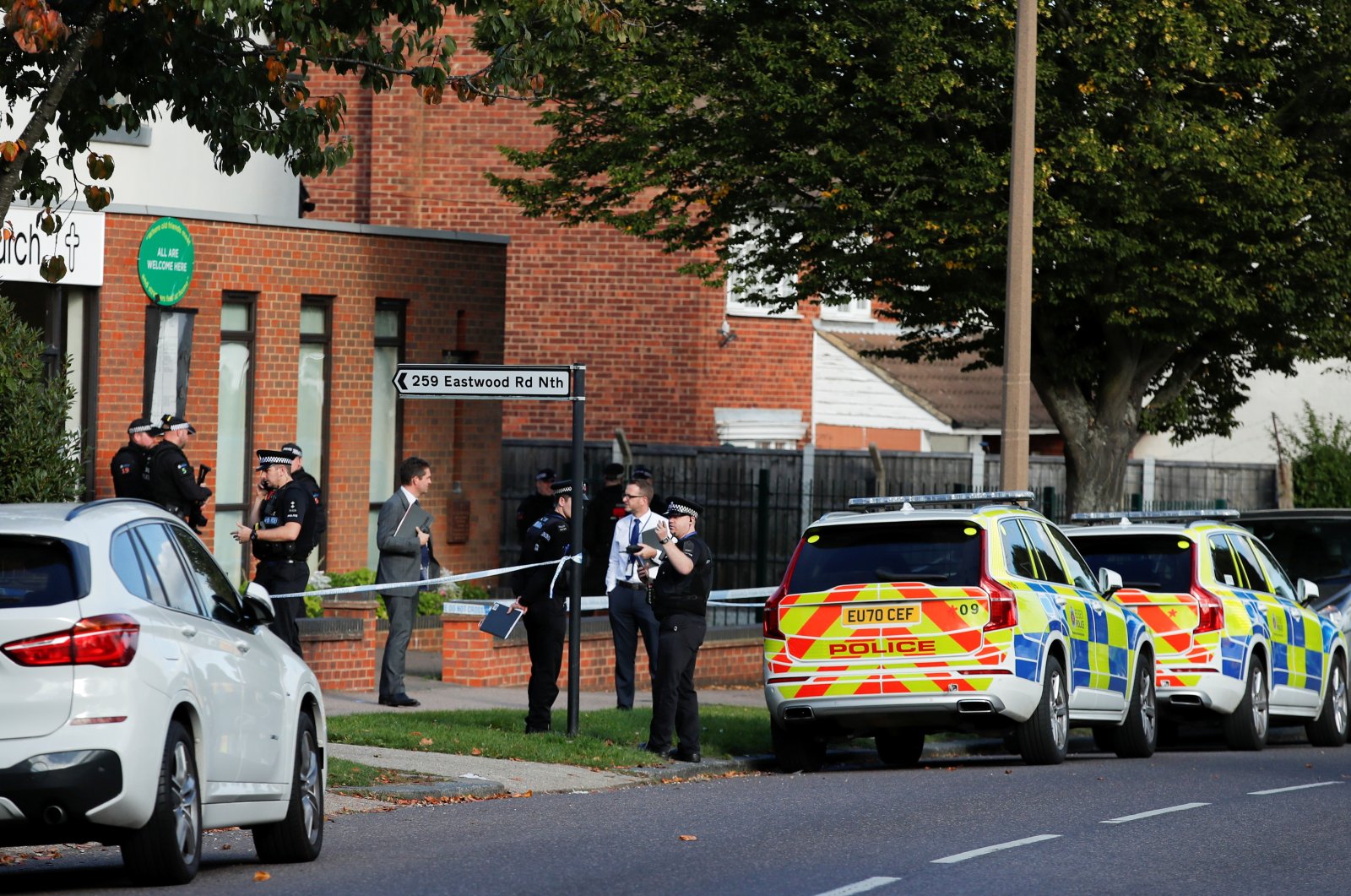 Police are seen at the scene where lawmaker David Amess was stabbed during a constituency surgery, in Leigh-on-Sea, Britain, Oct. 15, 2021. (Reuters Photo)