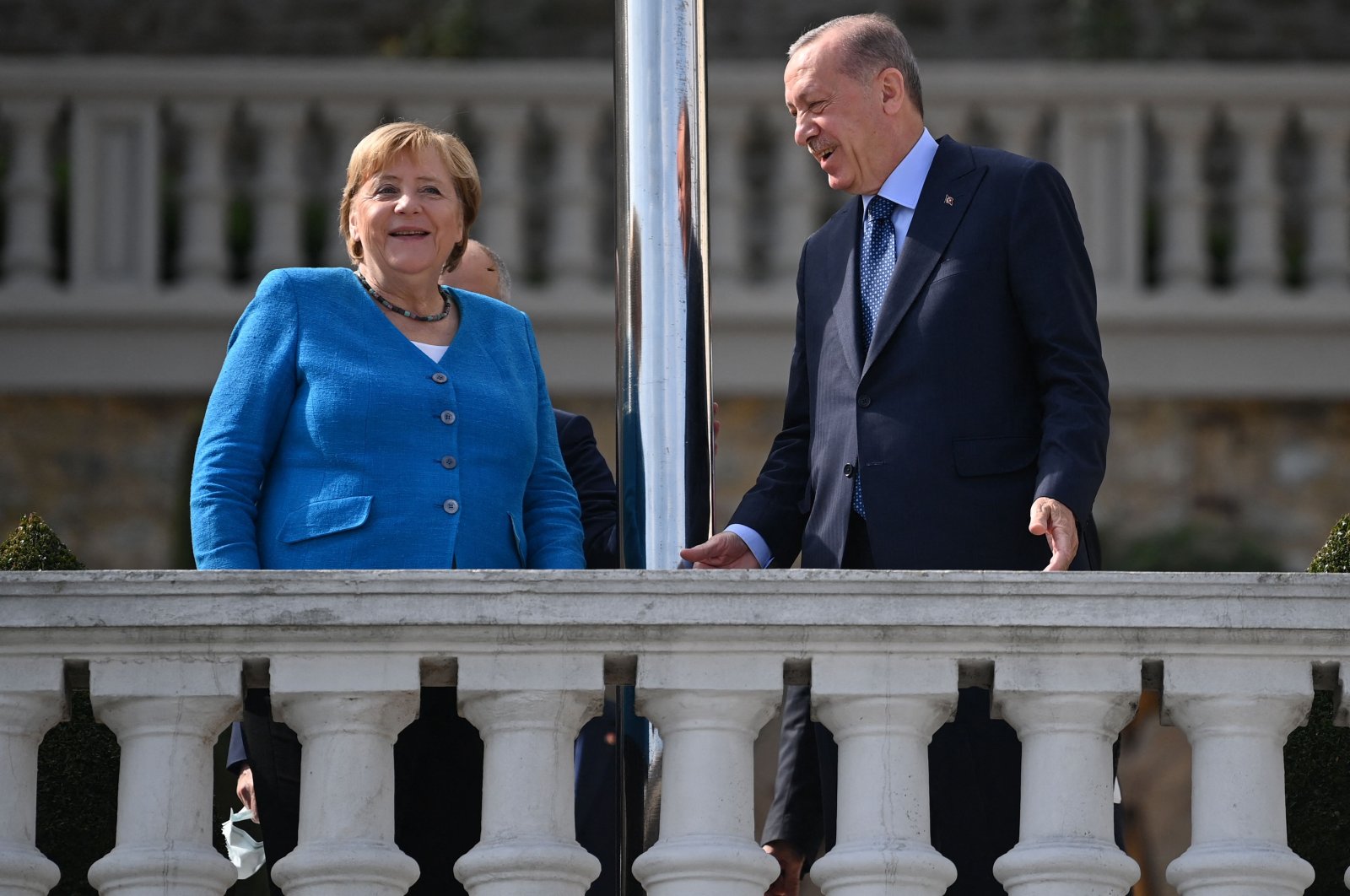 German Chancellor Angela Merkel (L) and President Recep Tayyip Erdoğan speak in Istanbul, Turkey, Oct. 16, 2021. (AFP Photo)