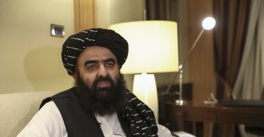 The acting foreign minister of the interim Taliban government, Amir Khan Muttaq, speaks to the Anadolu Agency, Oct 17, 2021. (AA Photo)