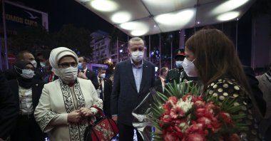 President Recep Tayyip Erdoğan (C) arrives in Luanda, Angola with his wife Emine Erdoğan (L), Oct. 17, 2021. (AA Photo)