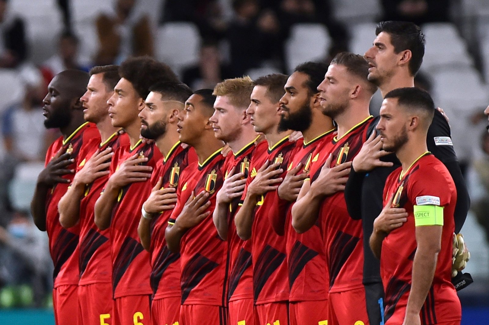 Belgium players line up during the national anthems before a UEFA Nations League semifinal match against France at the Allianz Stadium, in Turin, Italy, Oct. 7, 2021. (Reuters Photo)
