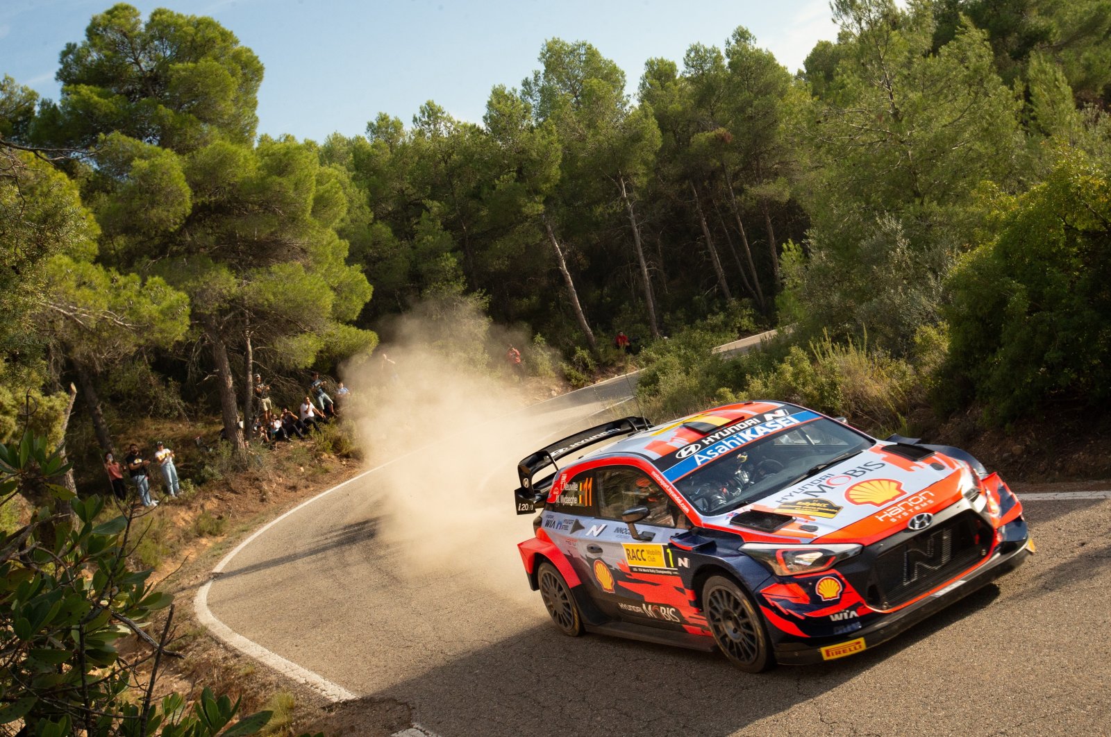Belgian driver Thievy Neuville in his Hyundai i20 Coupe takes a corner on the second day of the WRC Rally of Spain in La Granadella, Lleida, Spain, Oct. 15, 2021. (EPA Photo)
